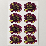 Sample full-color die-cut white-vinyl floral logo stickers