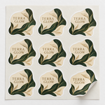 Sample full-color die-cut white-vinyl botanical logo stickers